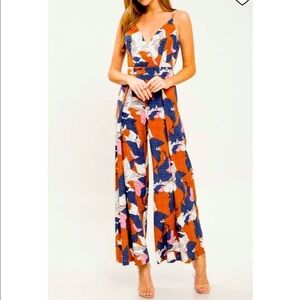 Navy, pink, and rust strappy jumpsuit. Size M​​​​​​​​